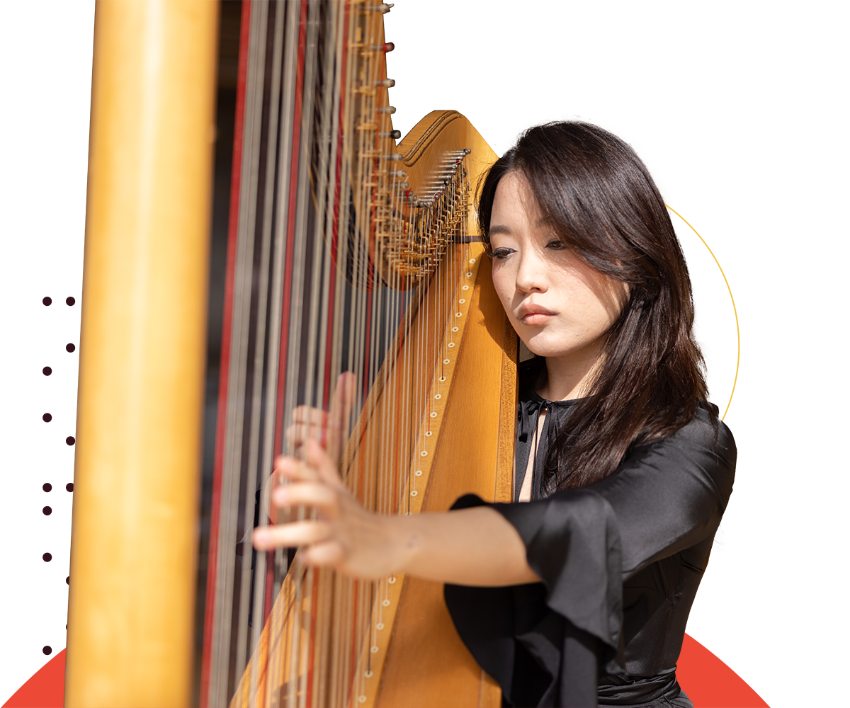 cutout of a harpist playing the harp