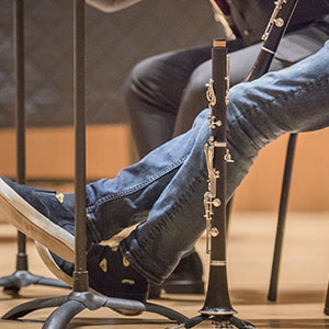 a clarinet player during rehearsal