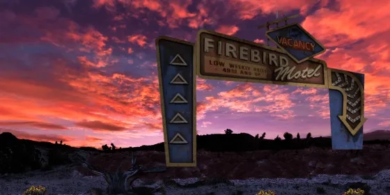 Sunset with Firebird Motel sign