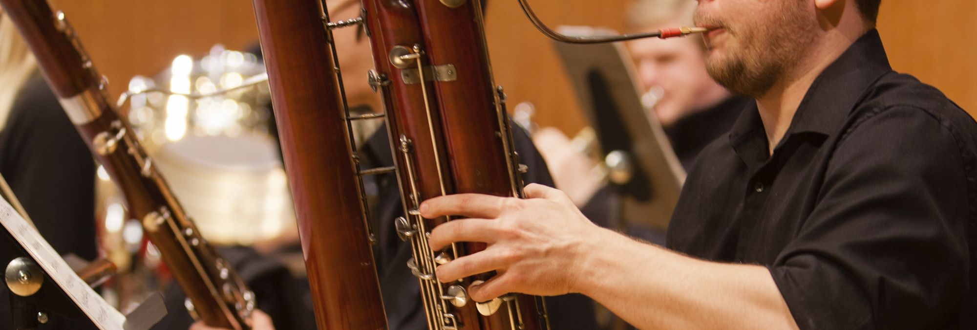 A close shot of a bassoon while being played