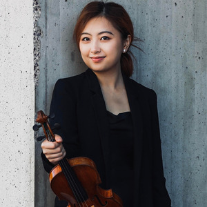 Vivian Ling with a violin