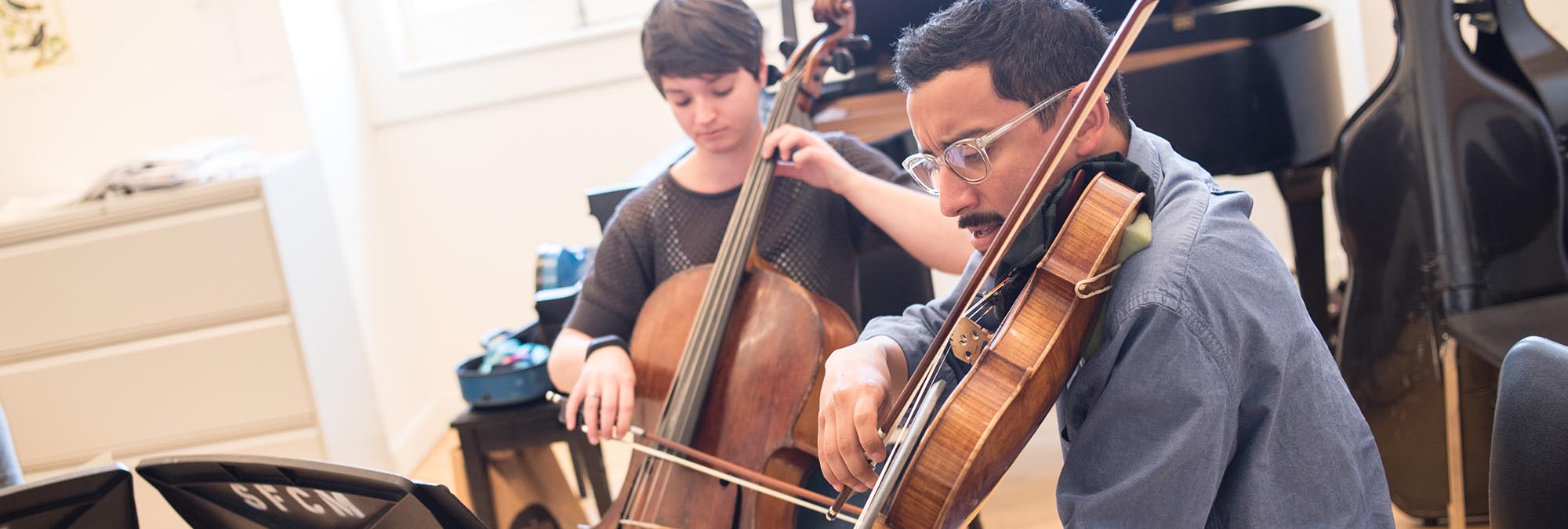 String Chamber group in a classroom rehearsing