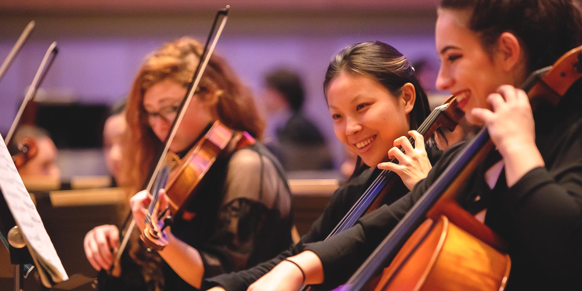 A photo of a female SFCM student playing cello