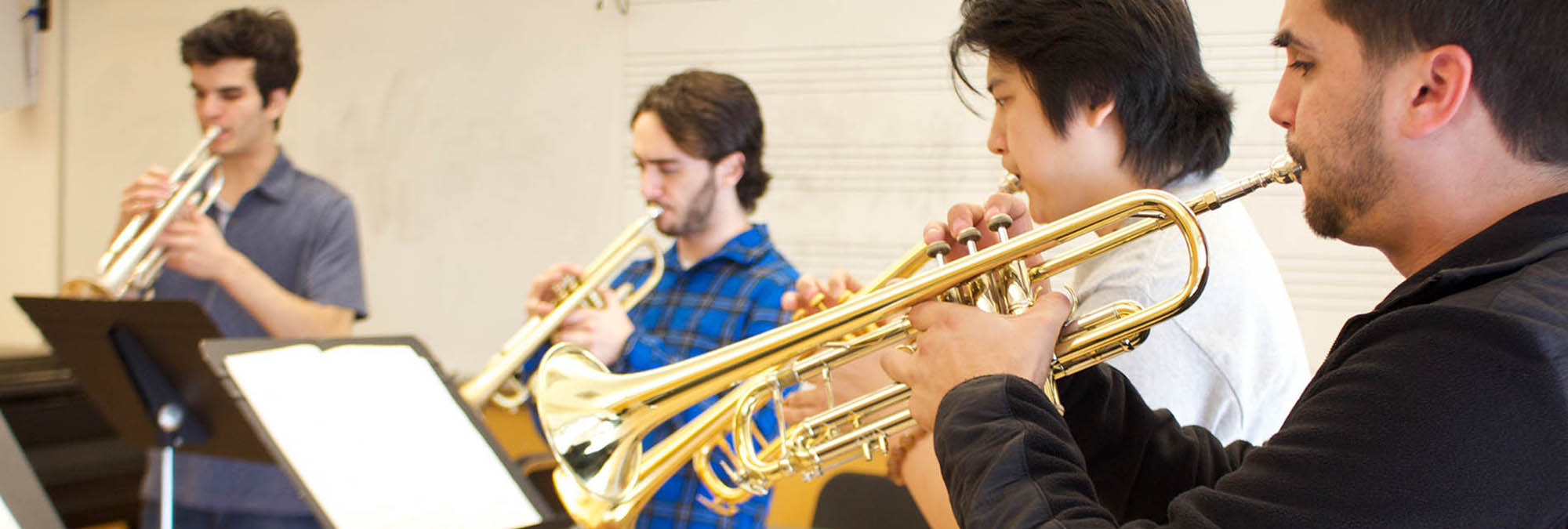 Brass chamber group playing for a coach