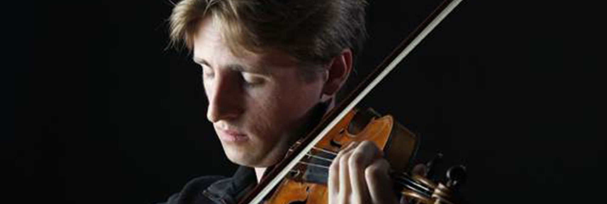 David McCaroll playing his violin