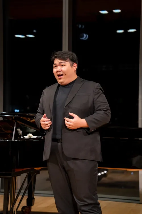 Sheng Feng Chan sings at 'Beyond the Aria' with Craig Terry in 2026.