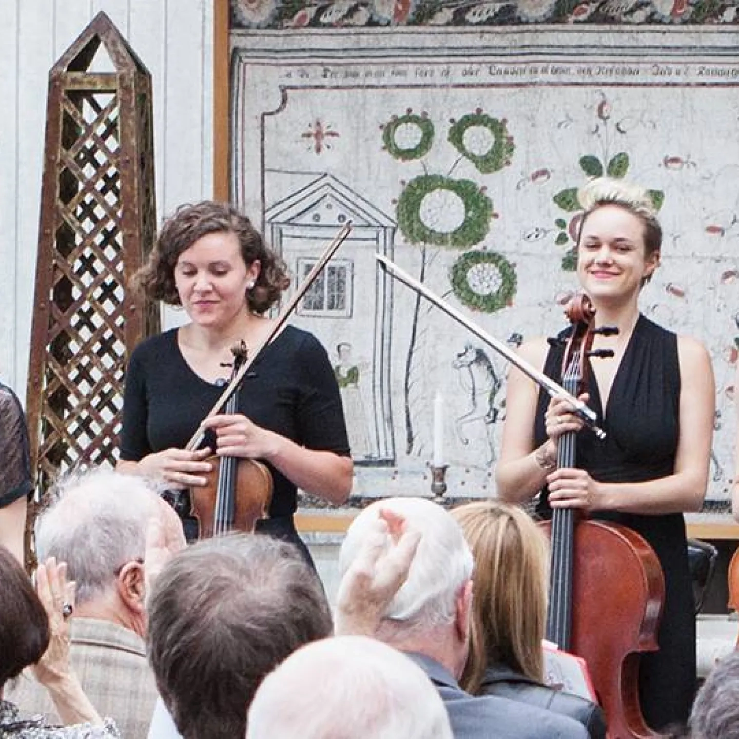 String musicians in front of audience