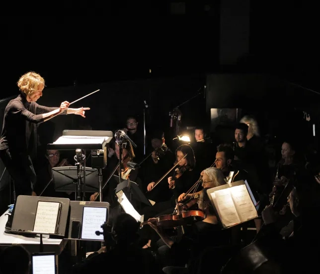 Nicole Paiement conducts the Opera Parallèle orchestra. (Credit: Cory Weaver)