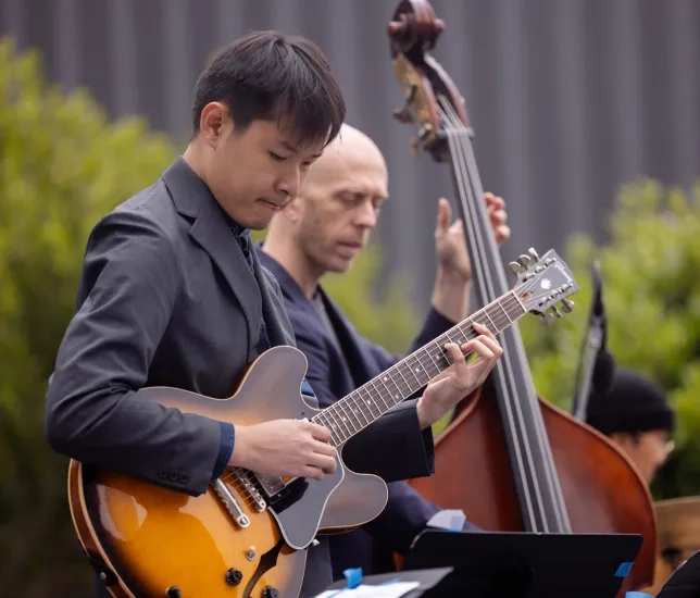 Tri Pham, with SFCM faculty Matt Brewer on bass.