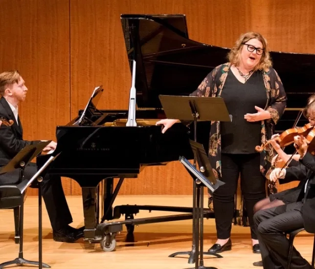 A photo of musicians performing