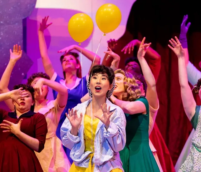 Musical Theatre Students Performing on a balloon filled stage