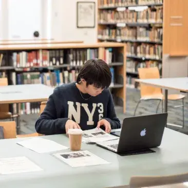 a student studying in the library