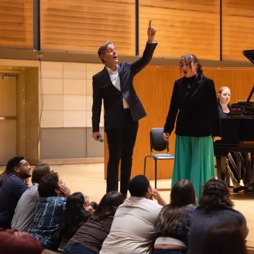 Jake Heggie and student Jordan Riek.