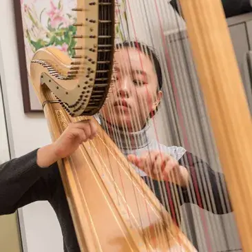 SFCM Pre-College student plays harp