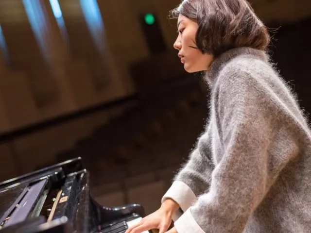 a pianist plays expressively in hume concert hall