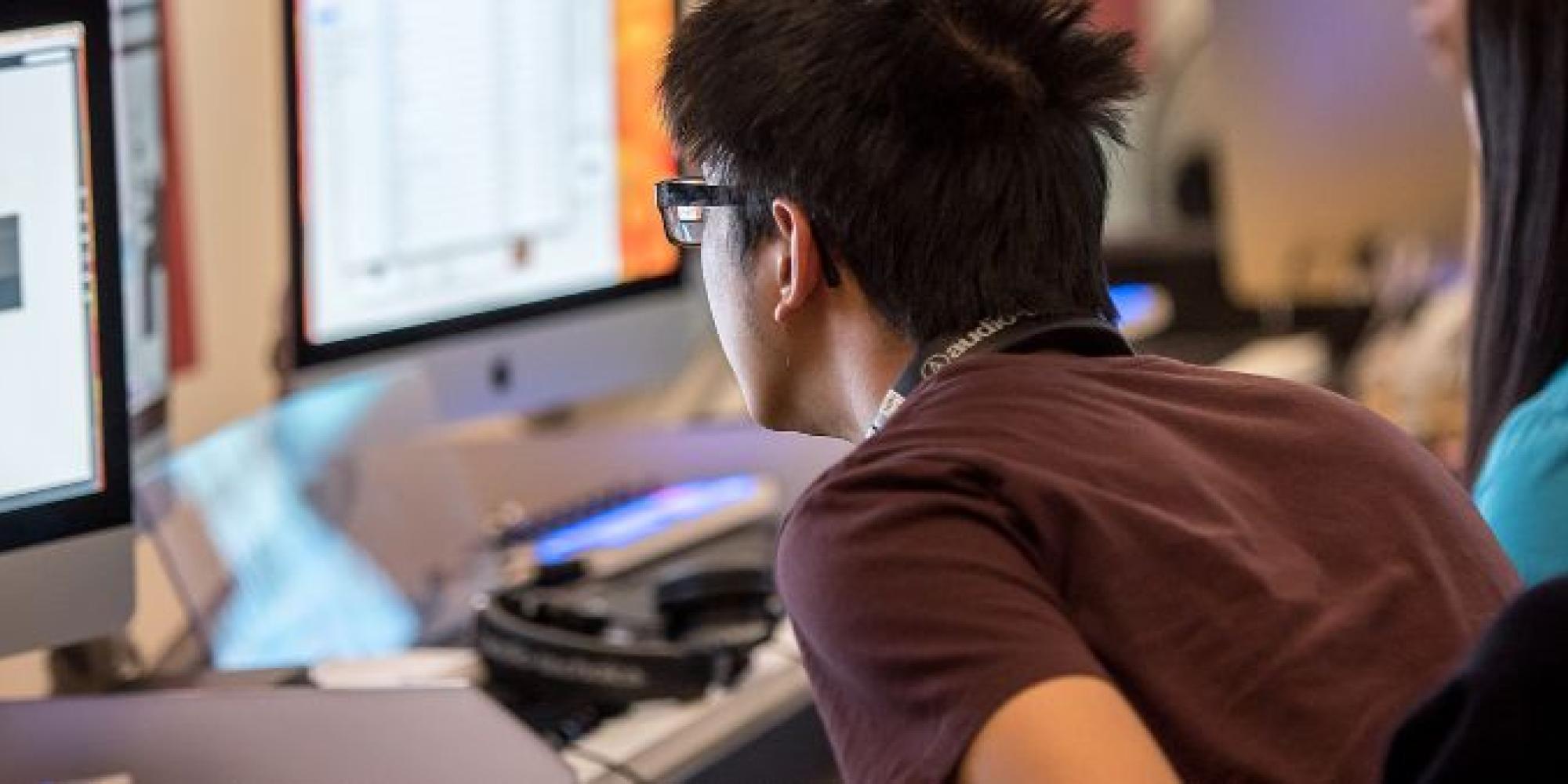 Student sitting in front of computer
