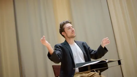 David Baker conducting 