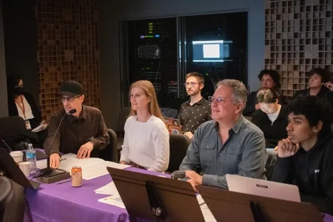 TAC students and members from Sony sit in the studio 