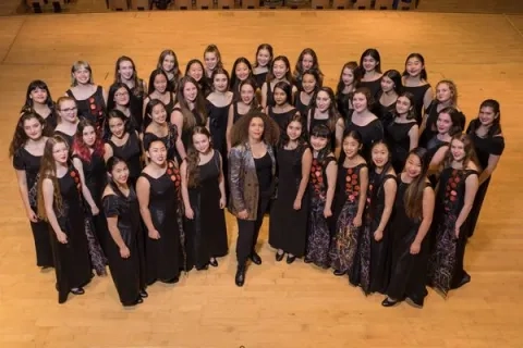 Members of the SF Girls Chorus with their music director