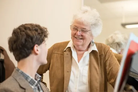 Elinor Armer and a student in 2016.