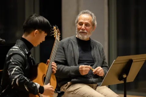 Sergio Assad works with a student in his masterclass.