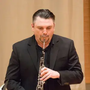 Russ deLuna playing oboe