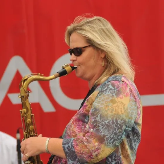 Kristen Strom playing saxophone