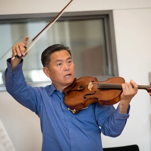 Yun Jie "Jay" Liu playing viola