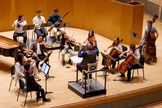 Students work with MTT in the Concert hall. 