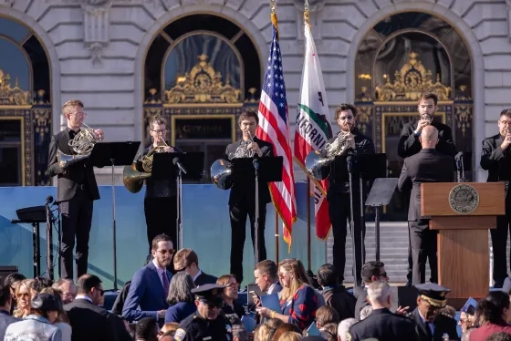 The ensemble is conducted by SFCM's Adam Luftman. 