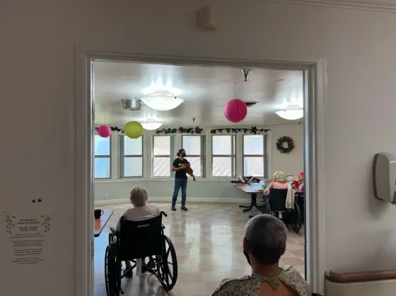 Mathias Gomez performs for seniors. 