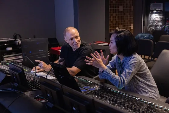 Visiting artist Composer Michael Abels visits with a TAC student.