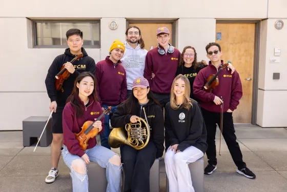 SFCM students show off merch in the Ann Getty Center. 