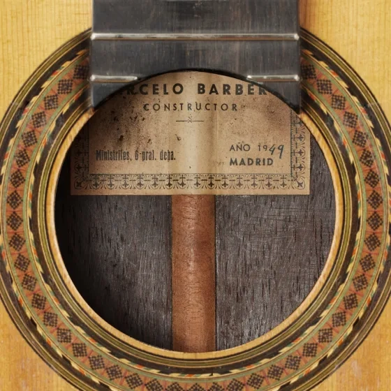 A close-up of the label and soundhole decoration (rosette) of the 1949 Barbero.
