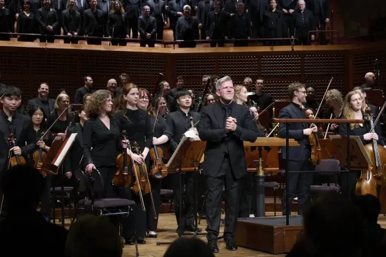 Edwin Outwater conducts students and musicians from the San Francisco Symphony. 