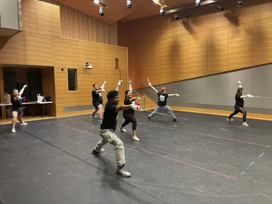 Students work with daggers and rapiers in one of Dave Maier's classes.