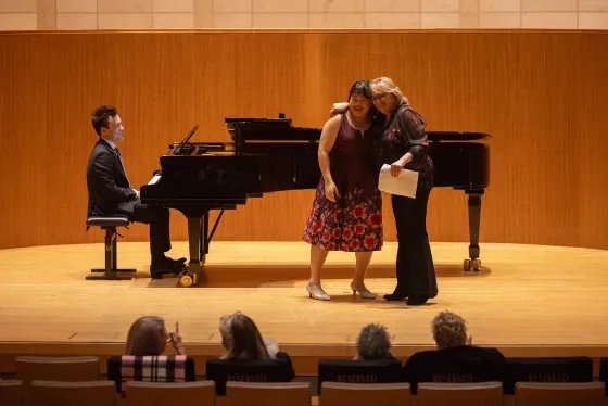 Student Phoebe Chee and Patt Racette with John Wilson on piano. 