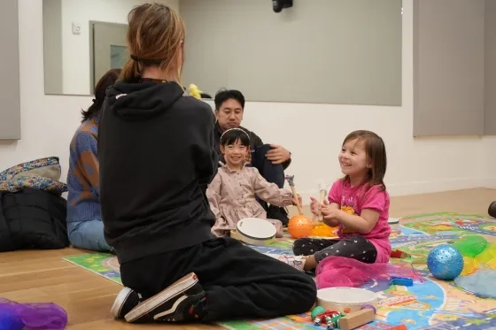 A teacher works with students in the Smart Start Program. 