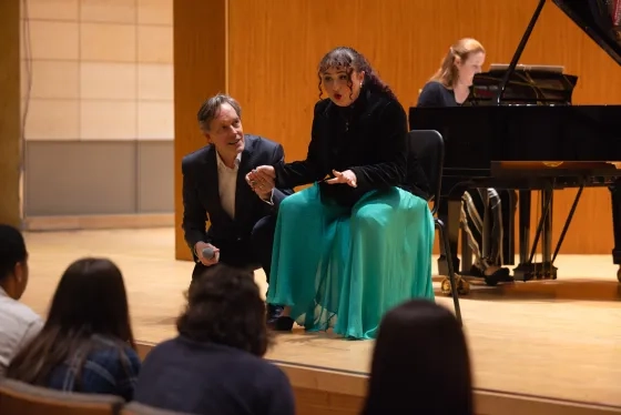 Jake Heggie and student Jordan Riek.