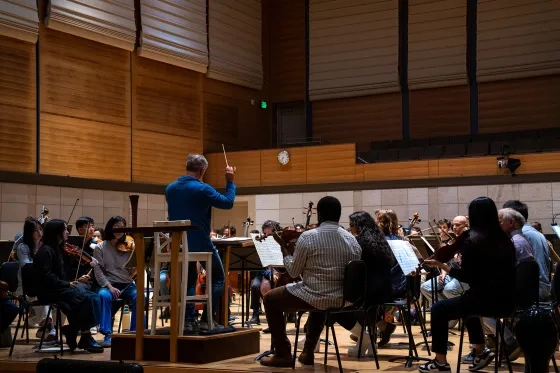 SFBO musicians play side-by-side with students.