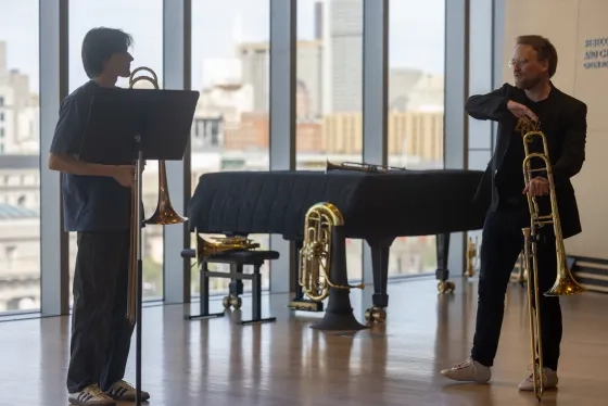 Student Thomas Valle and Canadian Brass' Keith Dyrdra.