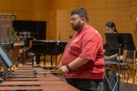 Percussion students Ahmad Yousefi and Isabelle Harmenta in Stewart Copeland's SFCM workshop.