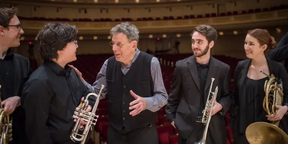 Philip Glass works with a groups of Brass players