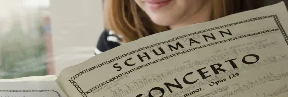 vocalist reading a Schumann score