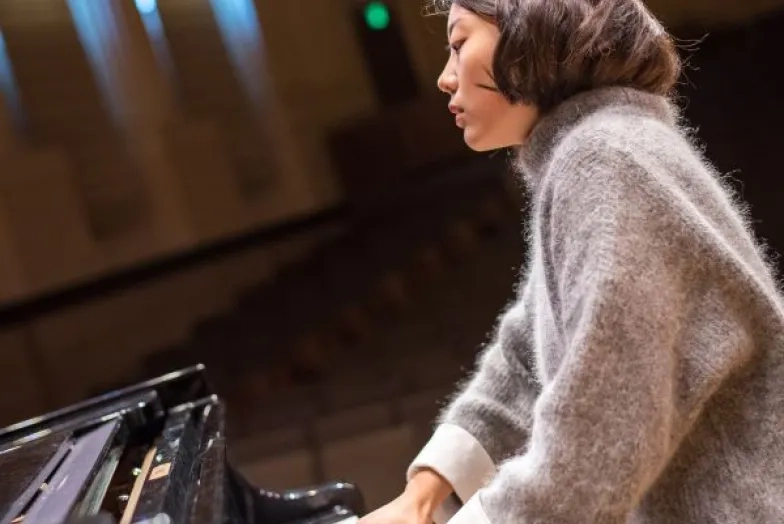 a pianist plays expressively in hume concert hall