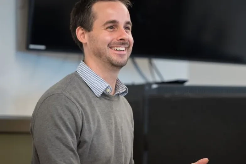 Joseph Stillwell sitting at piano