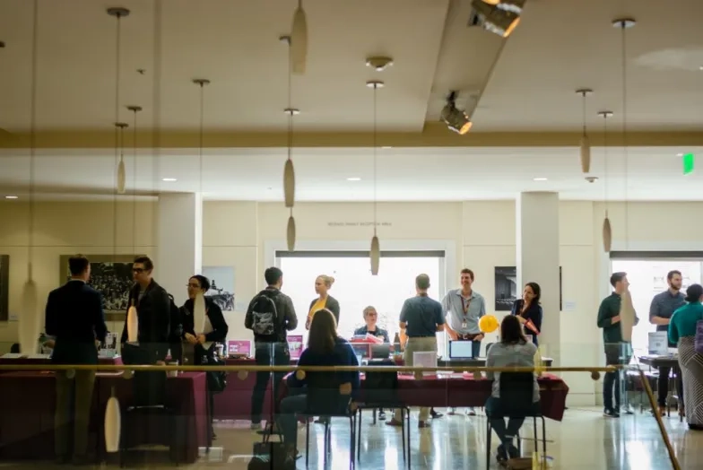 the job fair at sfcm. tables are set up with opportunities at each