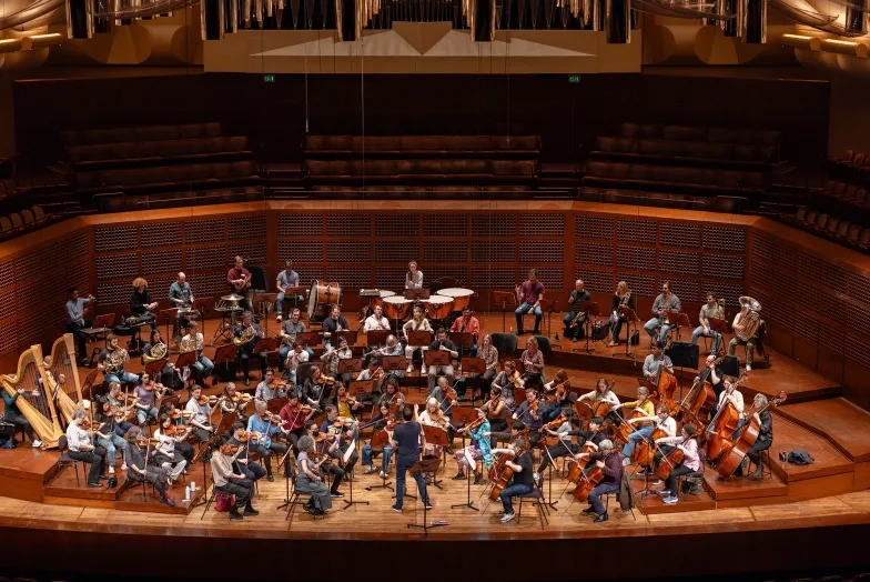 Students perform alongside the Academy of St Martin in the Fields.