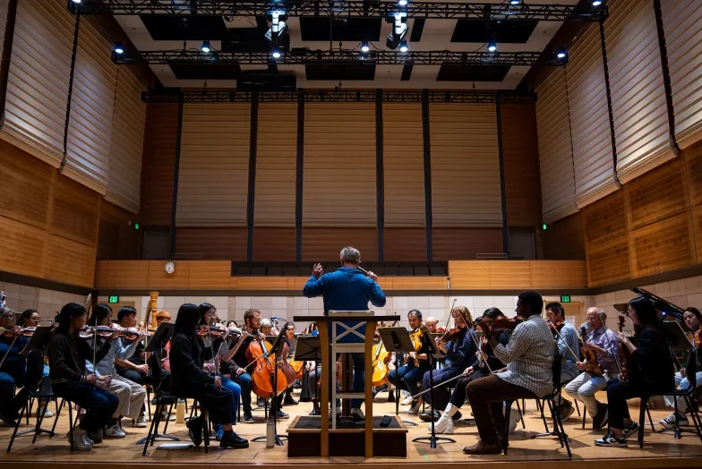 Students and SFBO musicians rehearse.