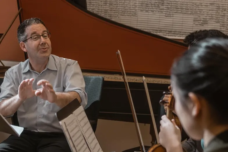 Faculty member Corey Jamason teaching his Baroque class